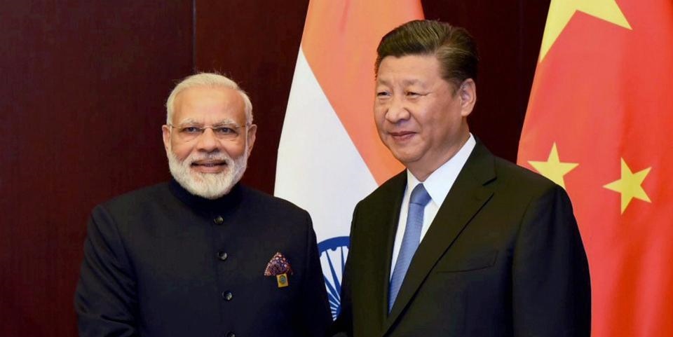 modi-meets-jinping_cbcdb78c-6245-11e7-b1de-0034c3d6ea80