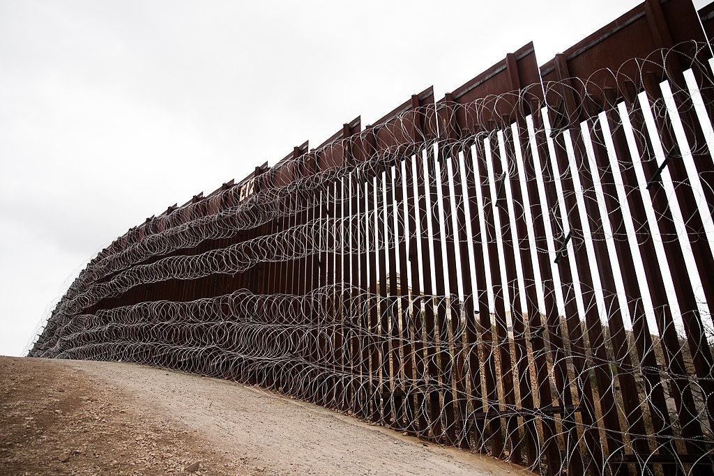 1024px-Nogales_Border_Wall_and_Concertina_Wire_-_33141969288