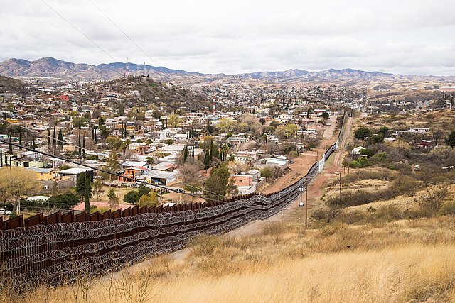 640px-Nogales_Border_Wall_and_Concertina_Wire_-_46965408602